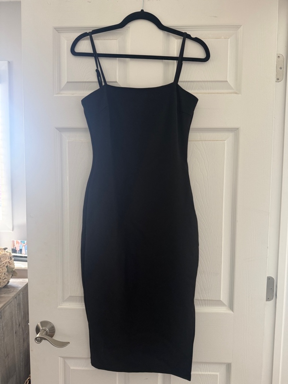 Lulu's classic Black Midi Spaghetti-Strap Sheath Dress